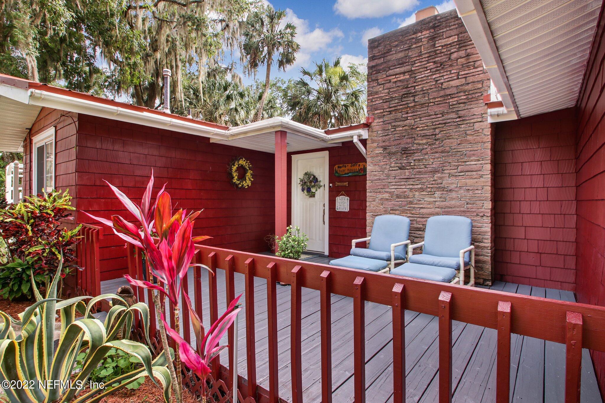101 Orange Street Satsuma, FL 32189 - Photo 5 of 67 a view of a wooden door with a small yard