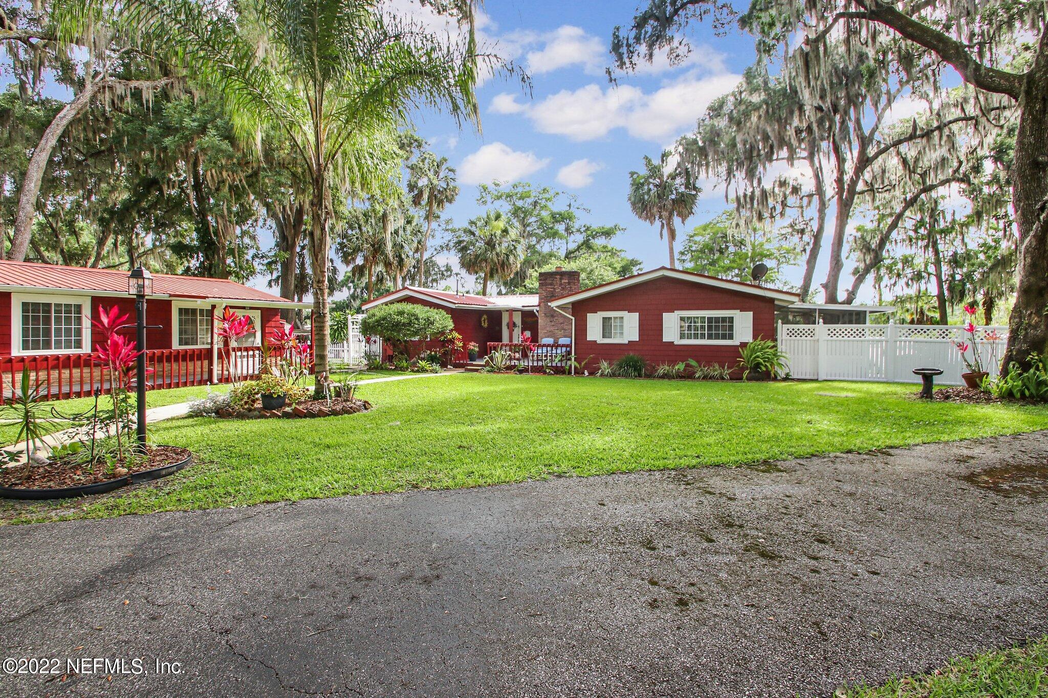 101 Orange Street Satsuma, FL 32189 - Photo 63 of 67 a front view of house with yard and green space