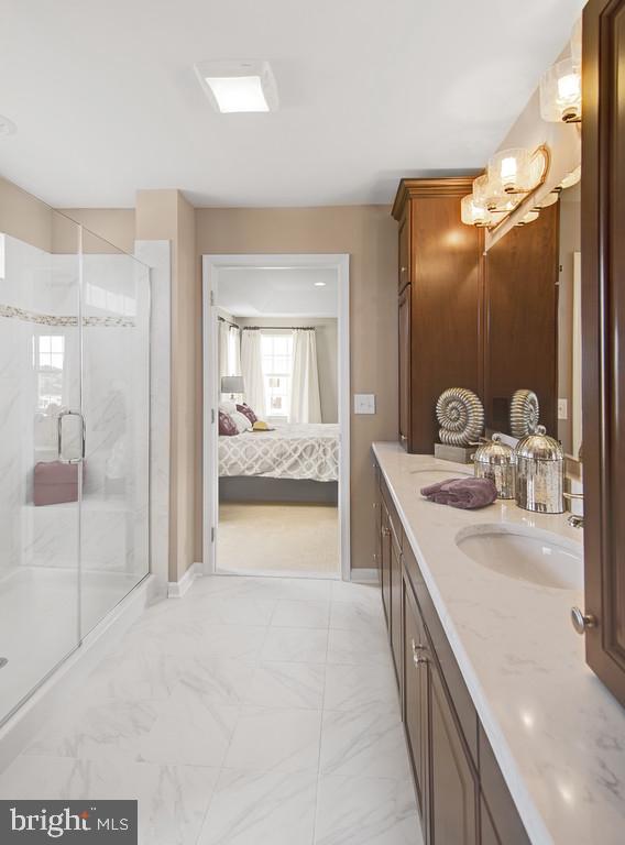 400 Rederick Lane, Unit 1 Middletown, DE 19709 - Photo 12 of 39 a en suite bathroom with a sink double vanity and a mirror