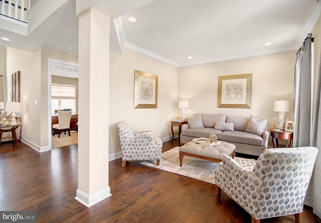 400 Rederick Lane, Unit 1 Middletown, DE 19709 - Photo 19 of 39 a living room with furniture and a wooden floor