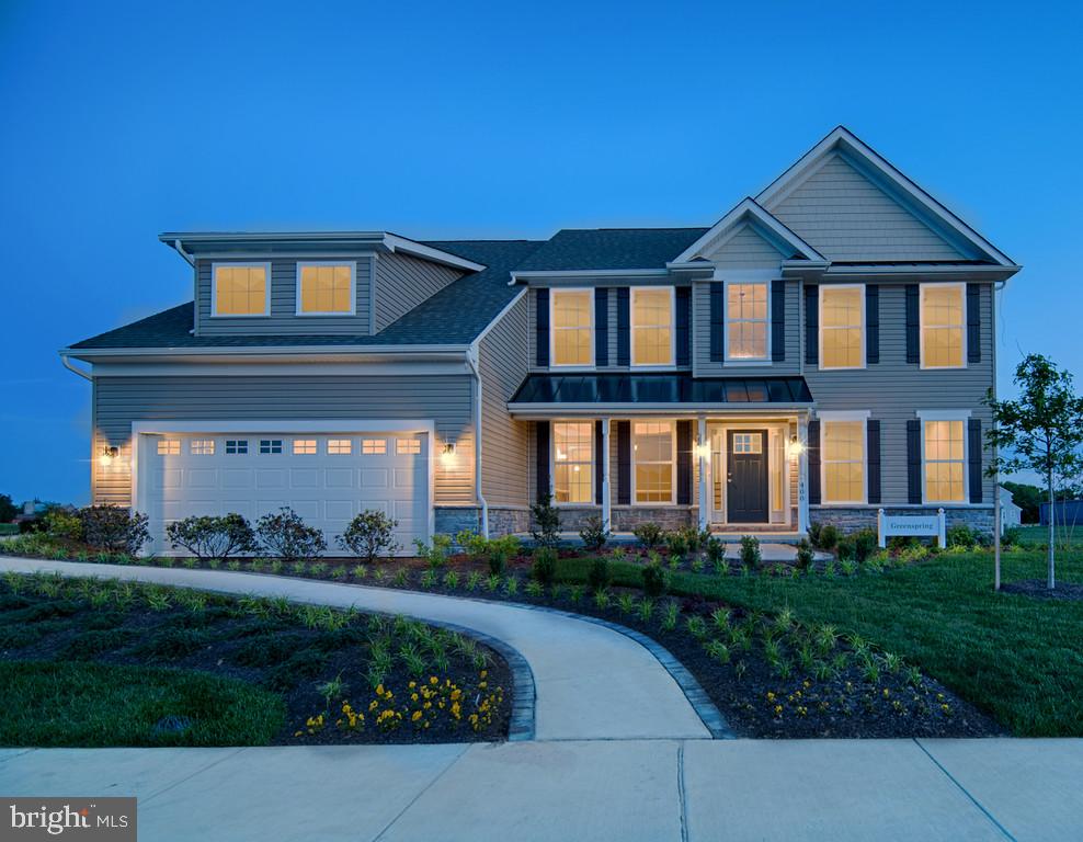 400 Rederick Lane, Unit 1 Middletown, DE 19709 - Photo 2 of 39 a front view of a house with a garden