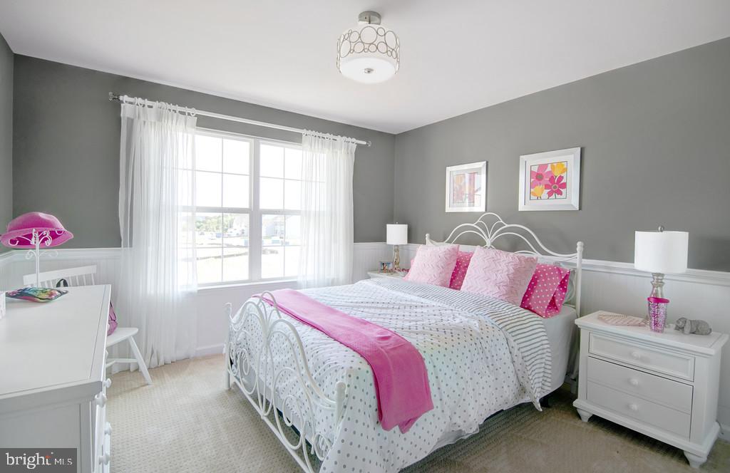 400 Rederick Lane, Unit 1 Middletown, DE 19709 - Photo 31 of 39 a bedroom with a bed and a window