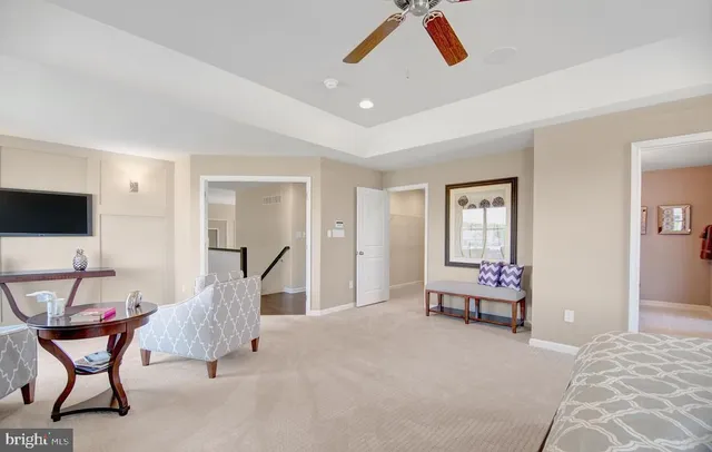 a room with furniture and air hockey table