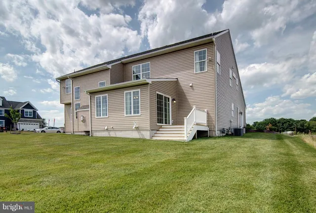 a big house with a big yard and more windows