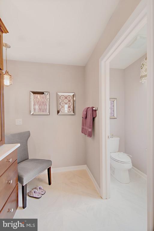 400 Rederick Lane, Unit 1 Middletown, DE 19709 - Photo 10 of 39 a bathroom with a toilet a sink and a shower