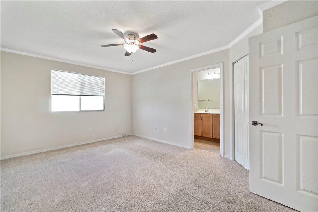 5905 Abbey Road, Unit 5905 Tamarac, FL 33321 - Photo 14 of 28 MASTER BEDROOM
