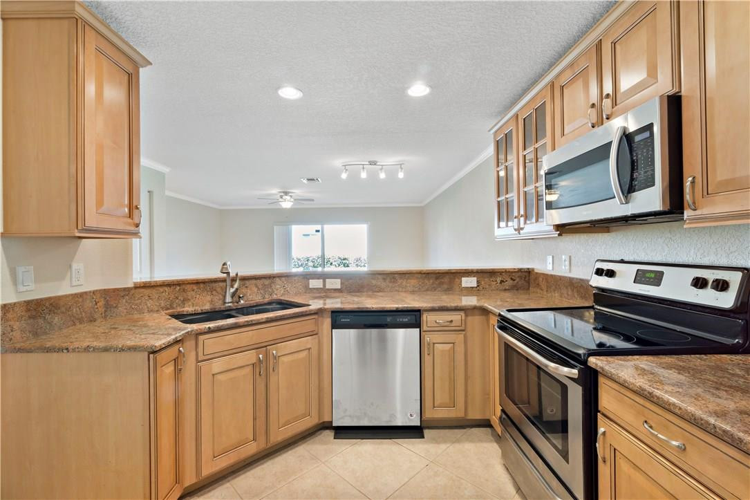 5905 Abbey Road, Unit 5905 Tamarac, FL 33321 - Photo 6 of 28 KITCHEN