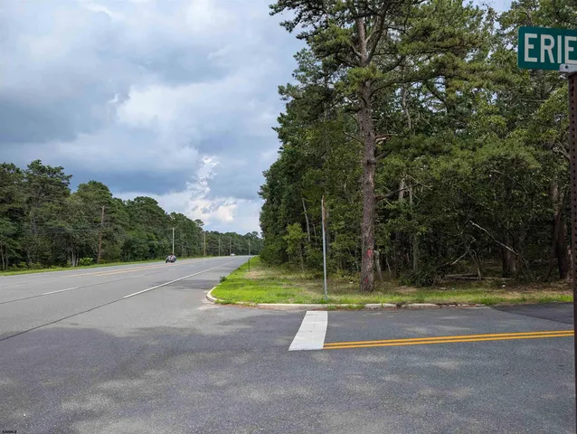 a view of swimming pool with a yard