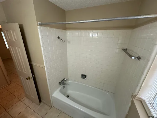 a bathroom with a bathtub
