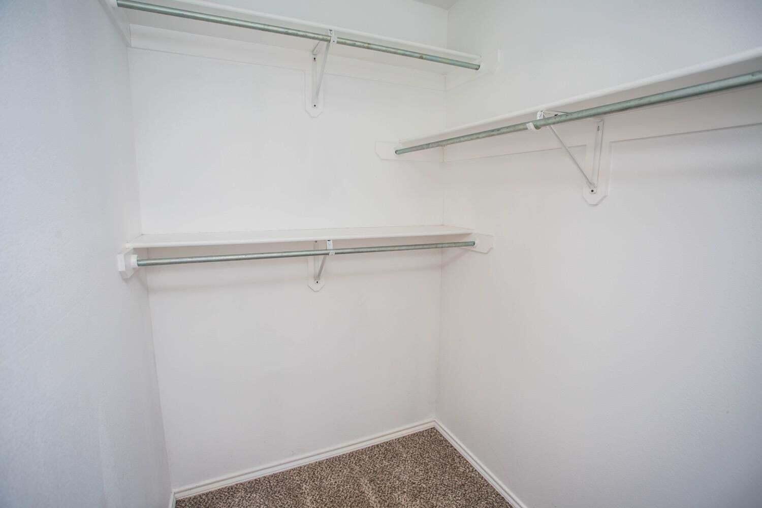 3606 Pontiac Avenue Lubbock, TX 79407 - Photo 12 of 17 a view of a room with racks on the wall