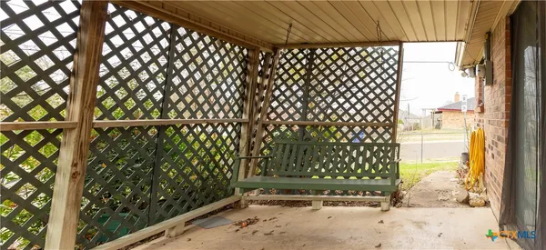 a view of a house with a yard and garage