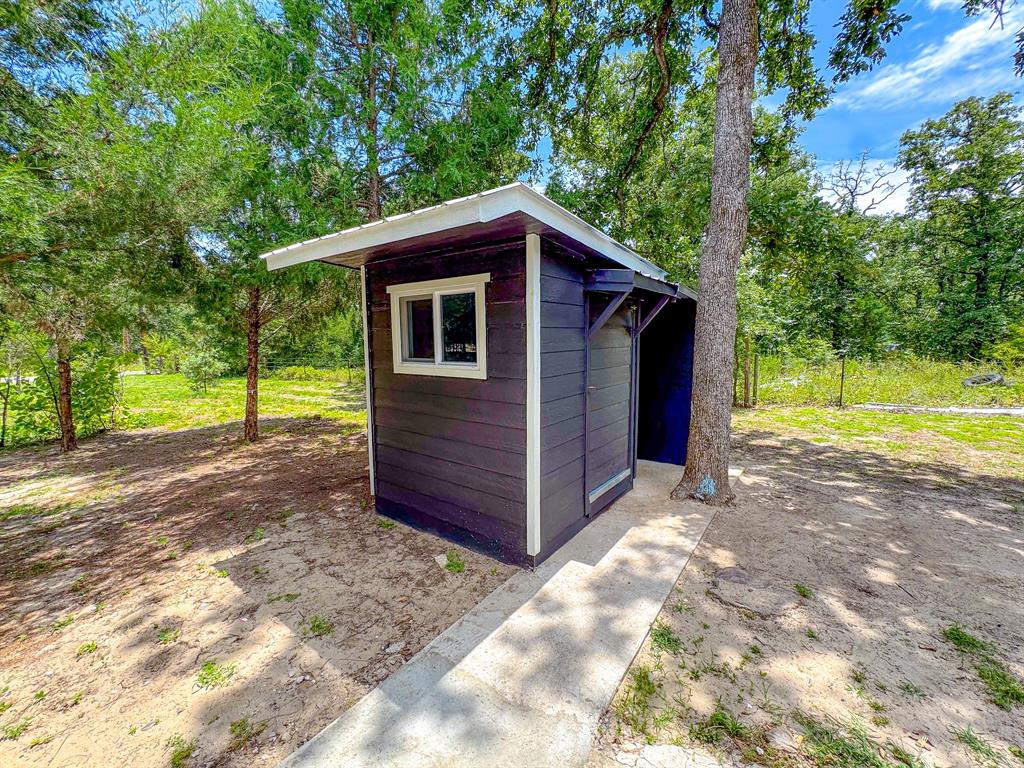 325 Fcr, Unit 1211 Fairfield, TX 75840 - Photo 26 of 28 a view of a house with a backyard