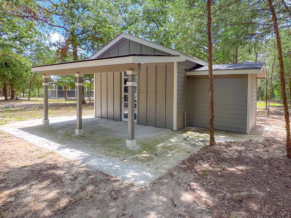 325 Fcr, Unit 1211 Fairfield, TX 75840 - Photo 3 of 28 a view of a house with a yard and large tree