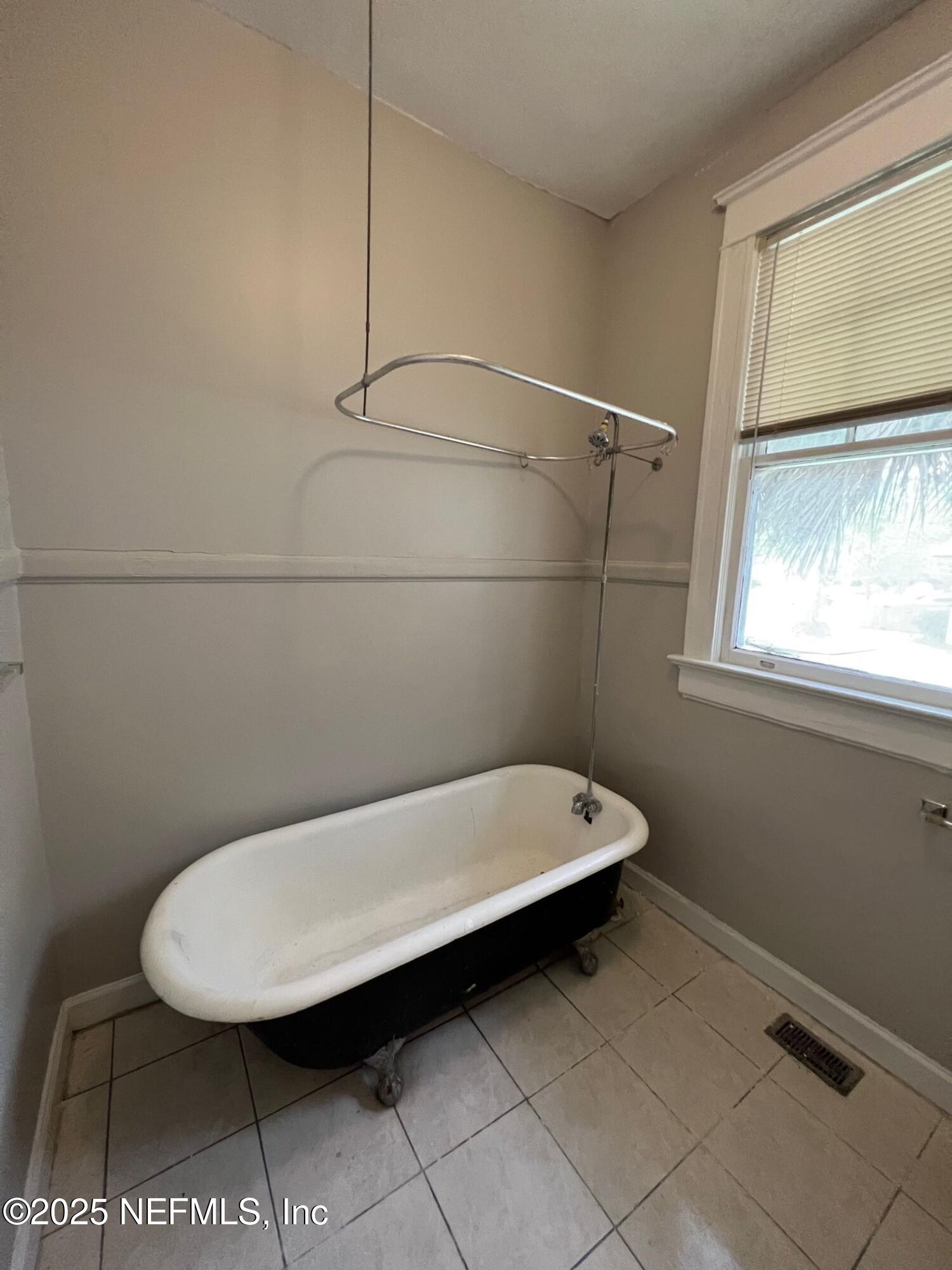 2627 Post Street, Unit 2 Jacksonville, FL 32204 - Photo 11 of 13 a bathroom with a toilet
