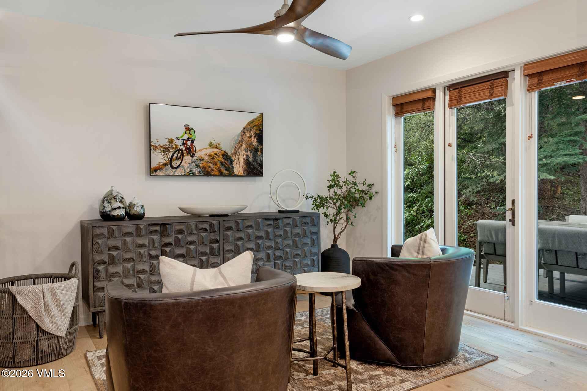 1592 Golf Terrace, Unit 55 Vail, CO 81657 - Photo 18 of 34 a dining room with furniture and window
