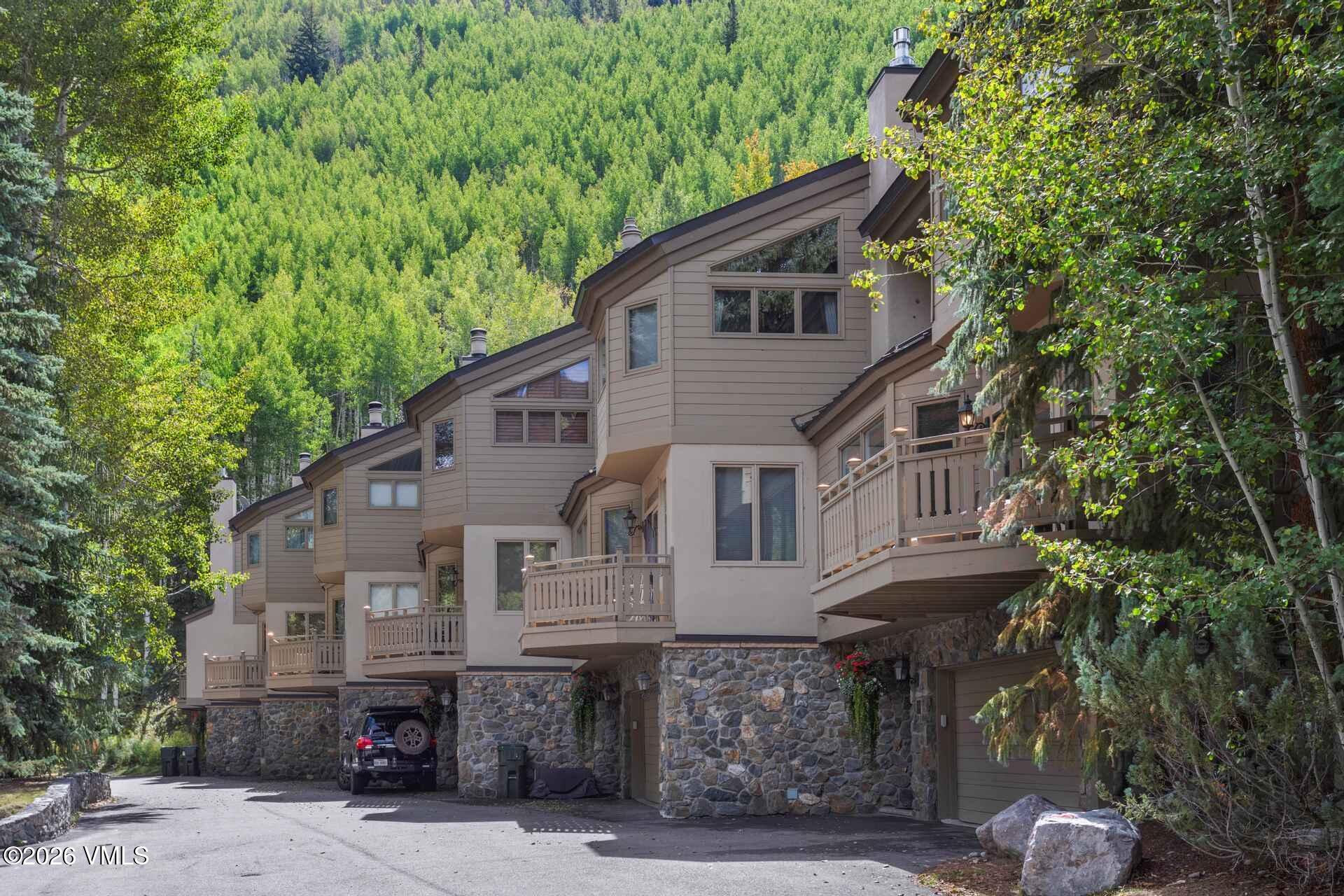 1592 Golf Terrace, Unit 55 Vail, CO 81657 - Photo 34 of 34 a house view with a outdoor space