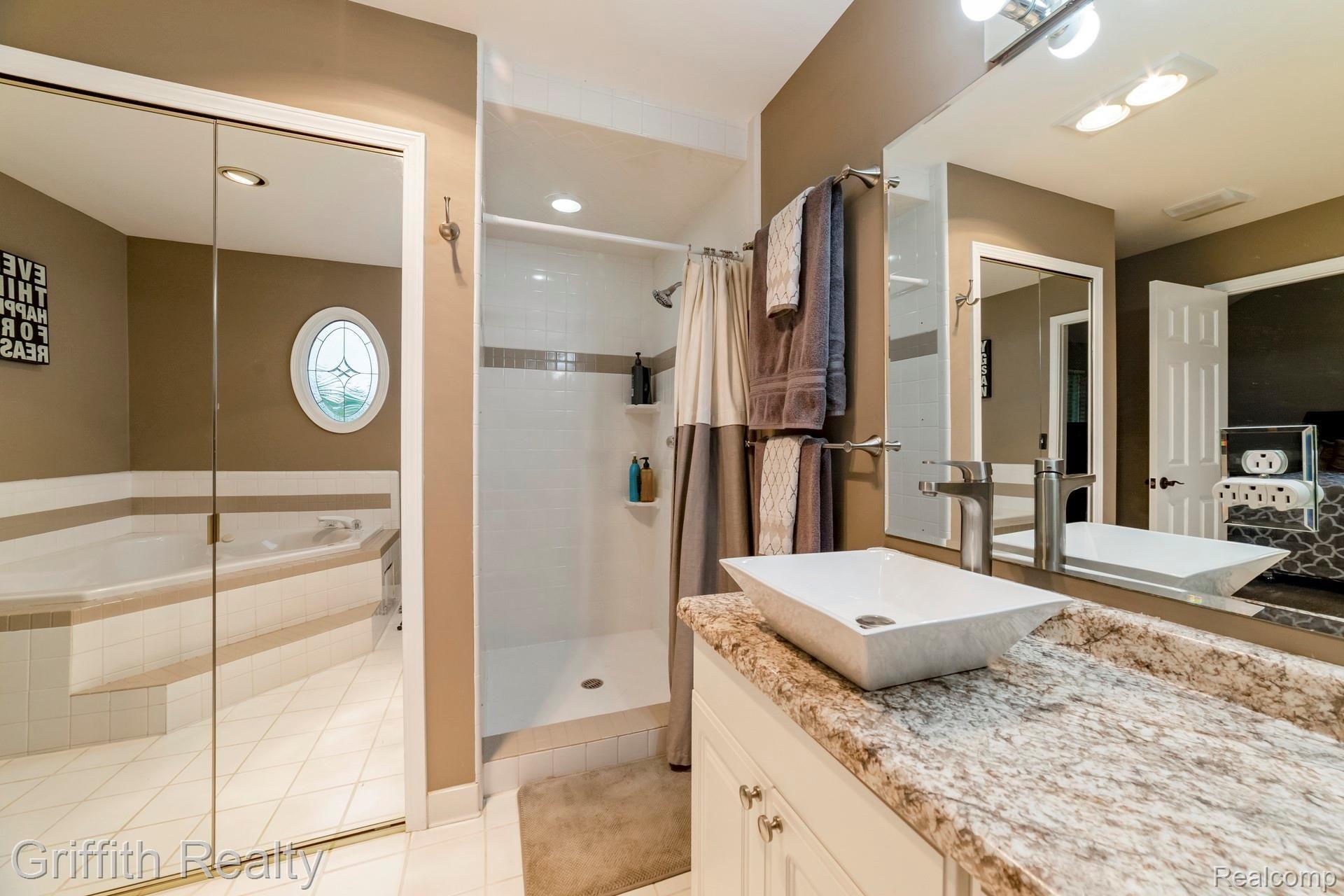 1899 Clover Ridge Drive Howell, MI 48843 - Photo 16 of 28 015-photo-master-bathroom-7163823.jpg