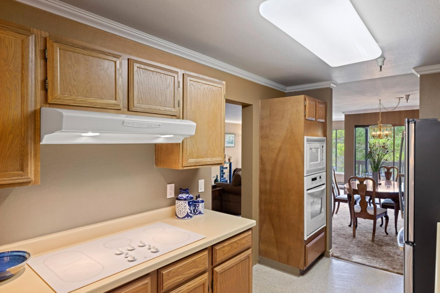 22 Shepherds Knoll Road Monterey, CA 93940 - Photo 11 of 21 a kitchen with stainless steel appliances granite countertop a sink refrigerator and cabinets
