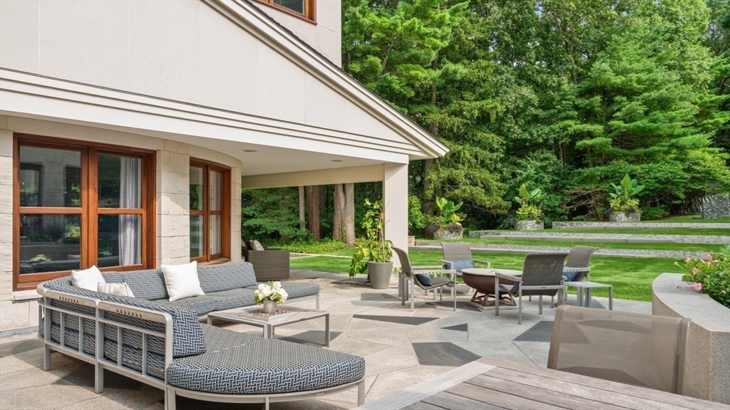 67 Byron Road Weston, MA 02493 - Photo 11 of 42 a view of a patio with couches table and chairs