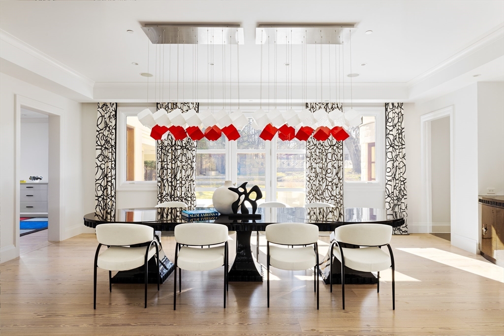 67 Byron Road Weston, MA 02493 - Photo 4 of 42 a view of a dining room with furniture and a chandelier