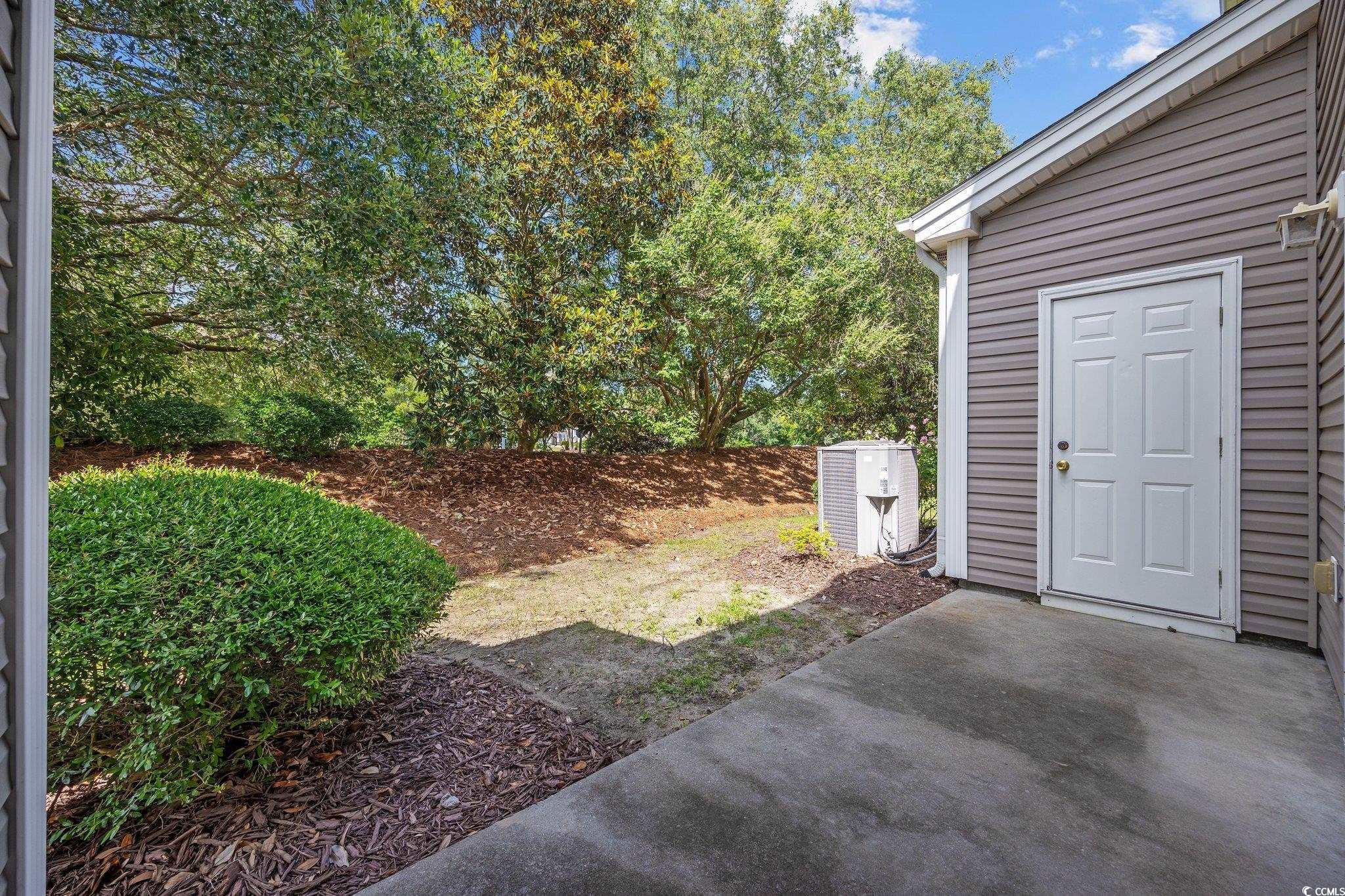 155 Chenoa Drive, Unit E Murrells Inlet, SC 29576 - Photo 22 of 34 Unfurnished room featuring carpet floors and ceiling fan