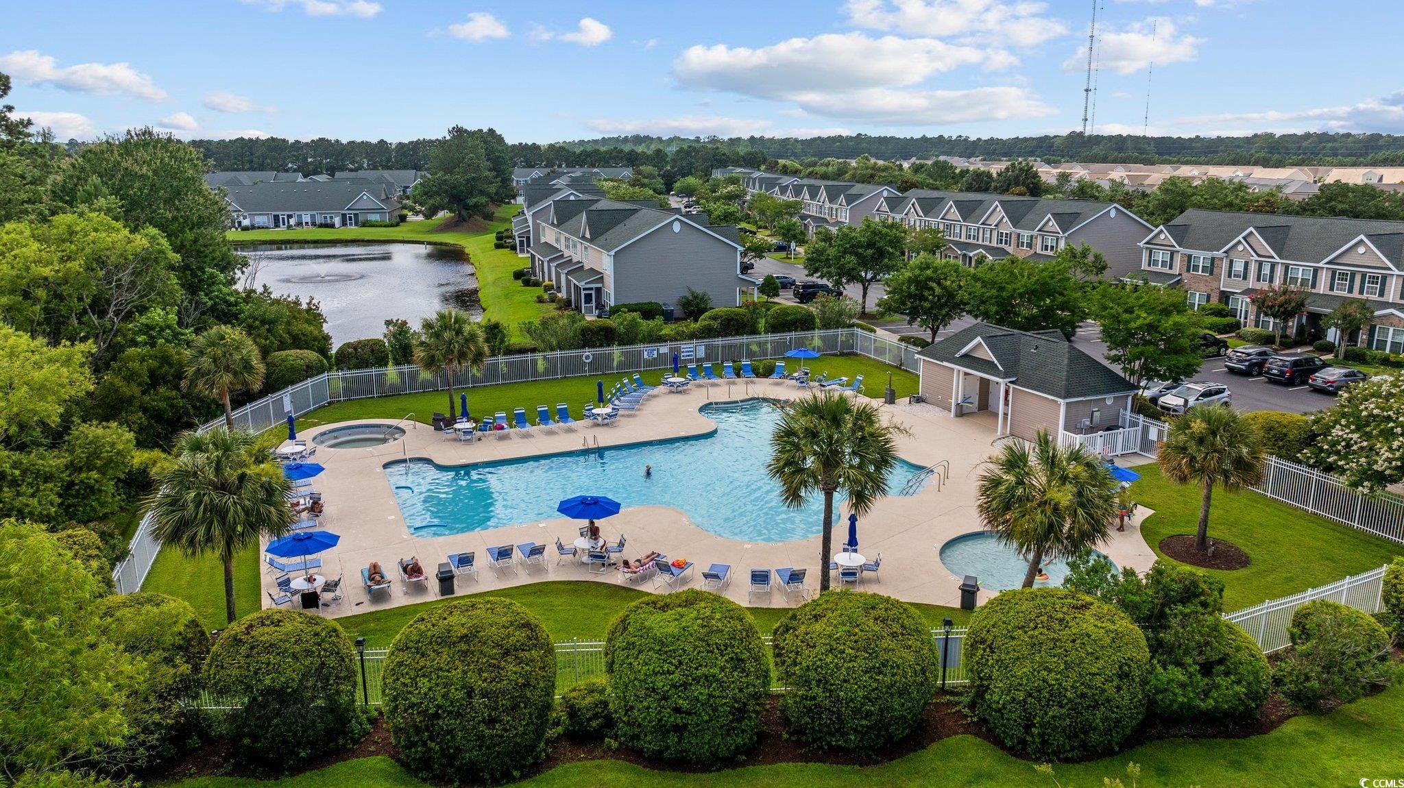 155 Chenoa Drive, Unit E Murrells Inlet, SC 29576 - Photo 31 of 34 Aerial overview of property's location featuring nearby suburban area and a nearby body of water