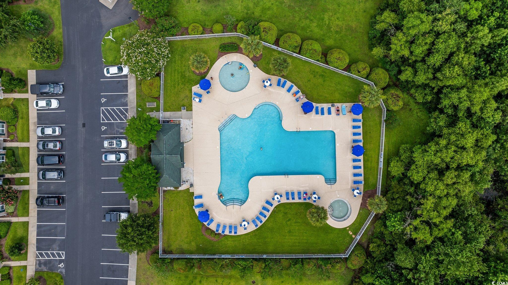 155 Chenoa Drive, Unit E Murrells Inlet, SC 29576 - Photo 33 of 34 Aerial view of residential area with a pool area
