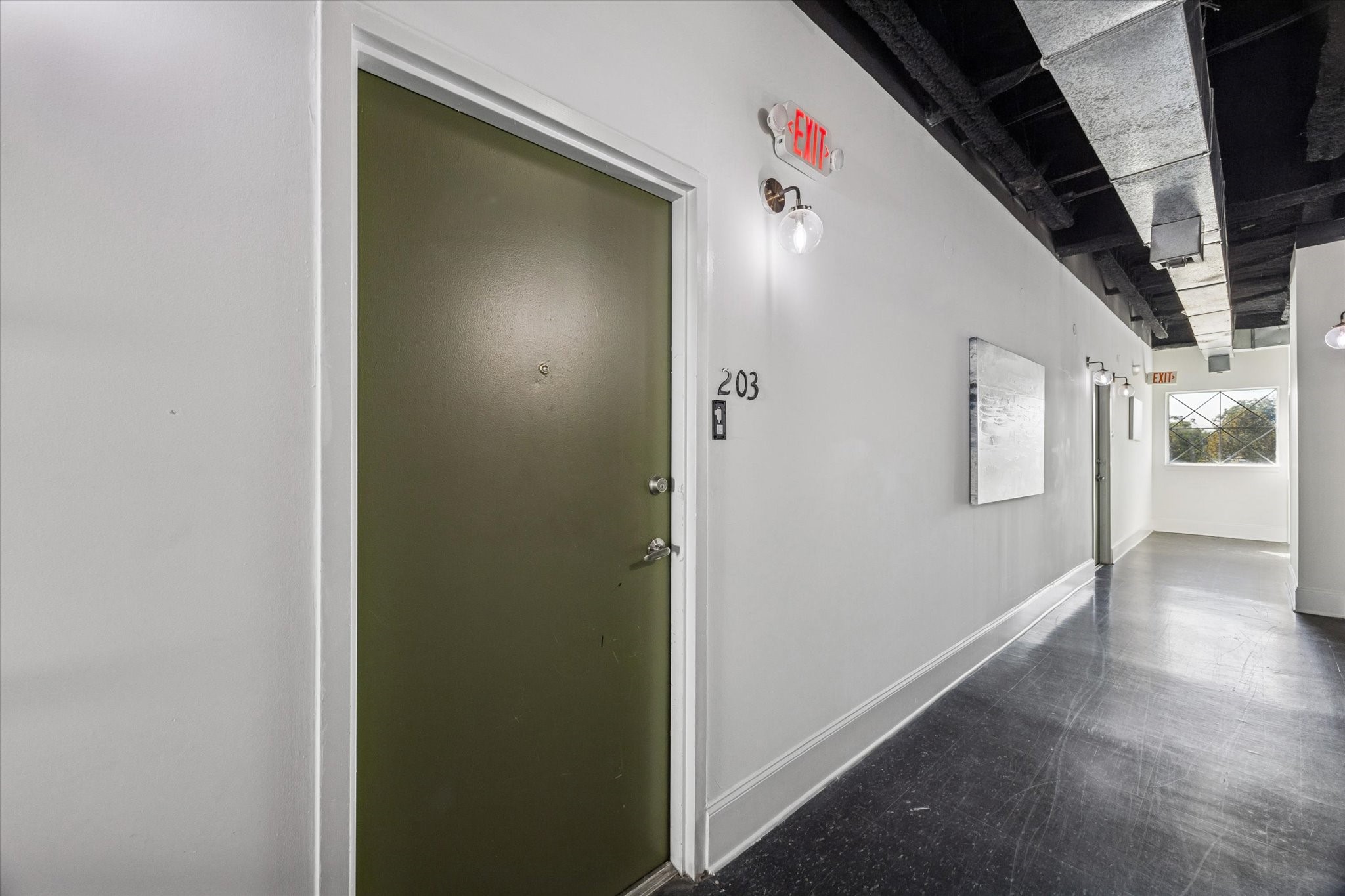 5017 Cornish Street, Unit 306 Houston, TX 77007 - Photo 7 of 9 a view of hallway with stairs