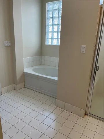 a bathroom with a bathtub