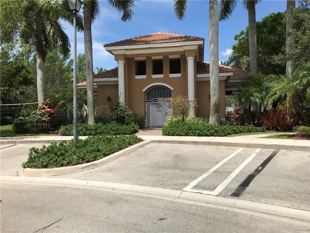 a view of a lake with a big yard