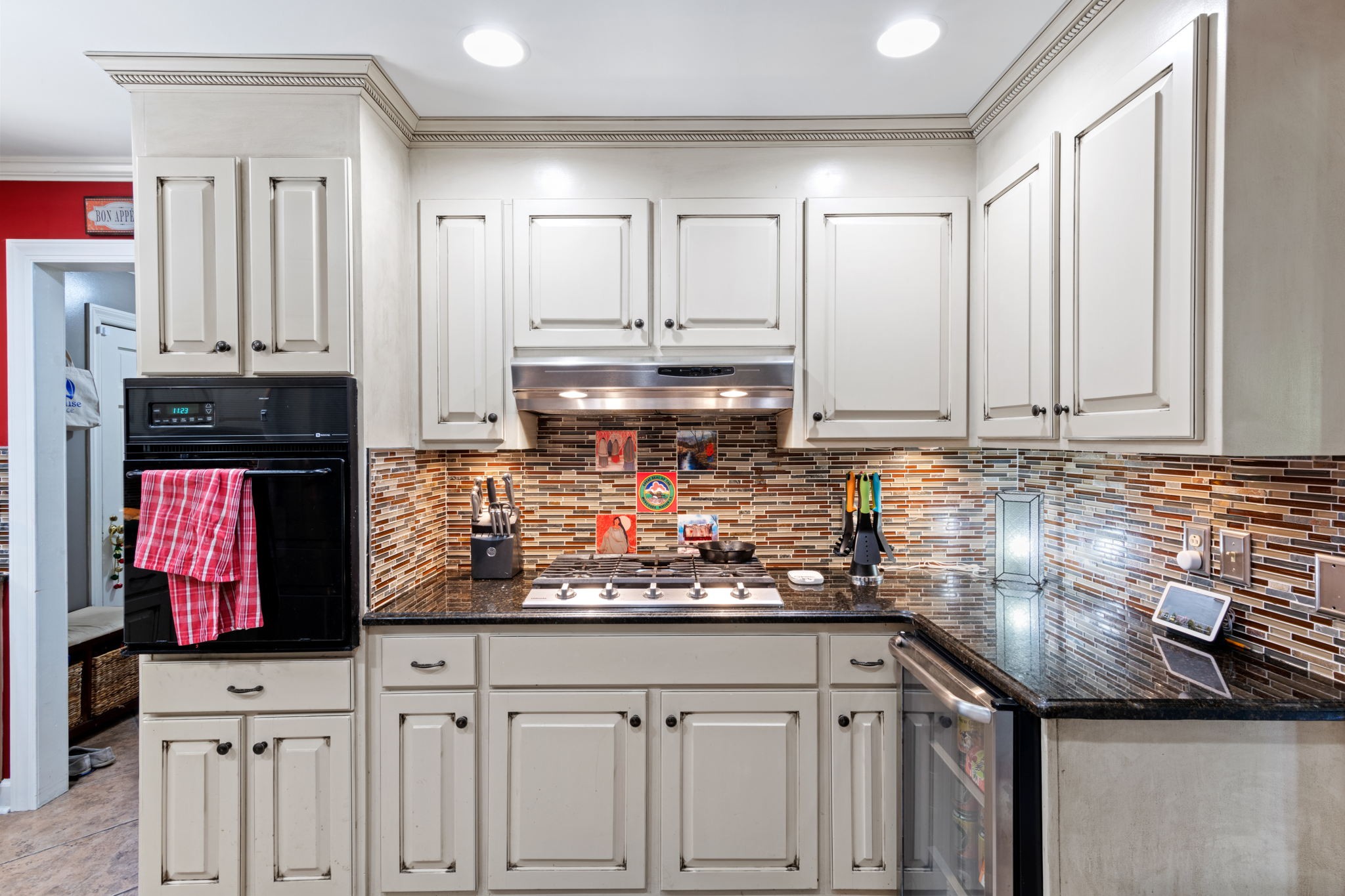 102 3rd Avenue East Springfield, TN 37172 - Photo 20 of 65 a kitchen with stainless steel appliances granite countertop a stove and white cabinets