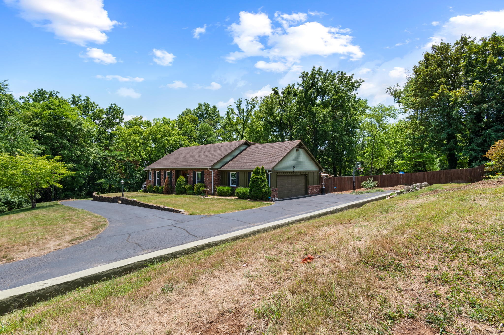 102 3rd Avenue East Springfield, TN 37172 - Photo 3 of 65 a view of a house with a yard and basketball court