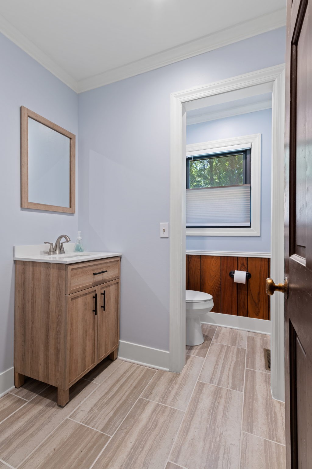 102 3rd Avenue East Springfield, TN 37172 - Photo 40 of 65 a bathroom with a sink a mirror and a bathtub