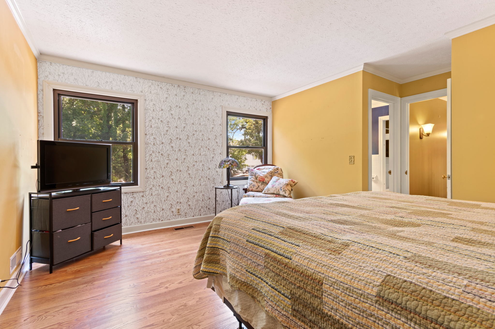 102 3rd Avenue East Springfield, TN 37172 - Photo 43 of 65 a bedroom with a bed and wooden floor