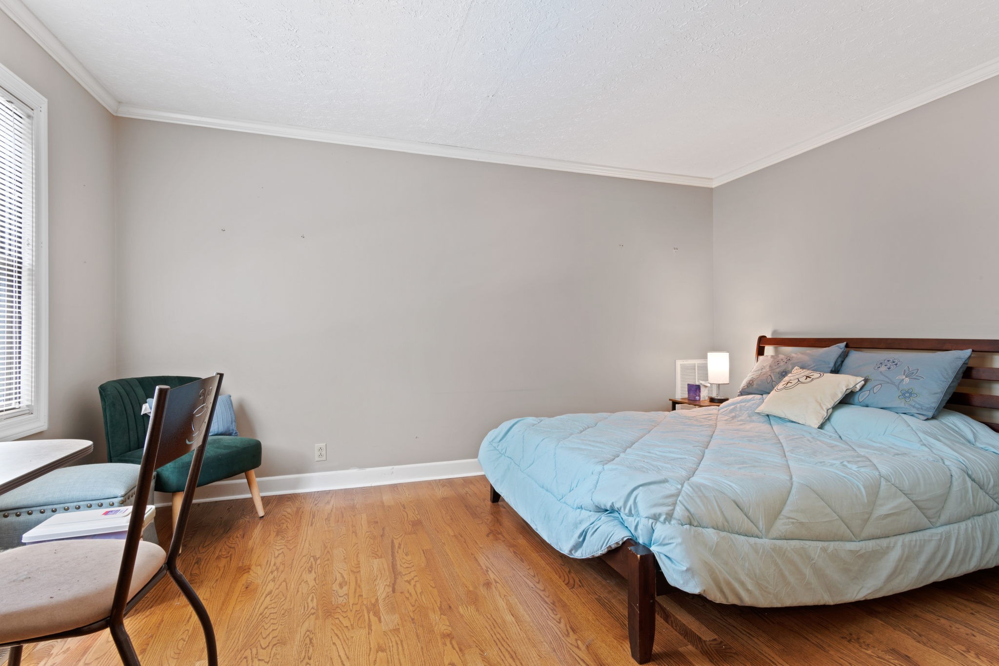 102 3rd Avenue East Springfield, TN 37172 - Photo 44 of 65 a bedroom with a bed and wooden floor