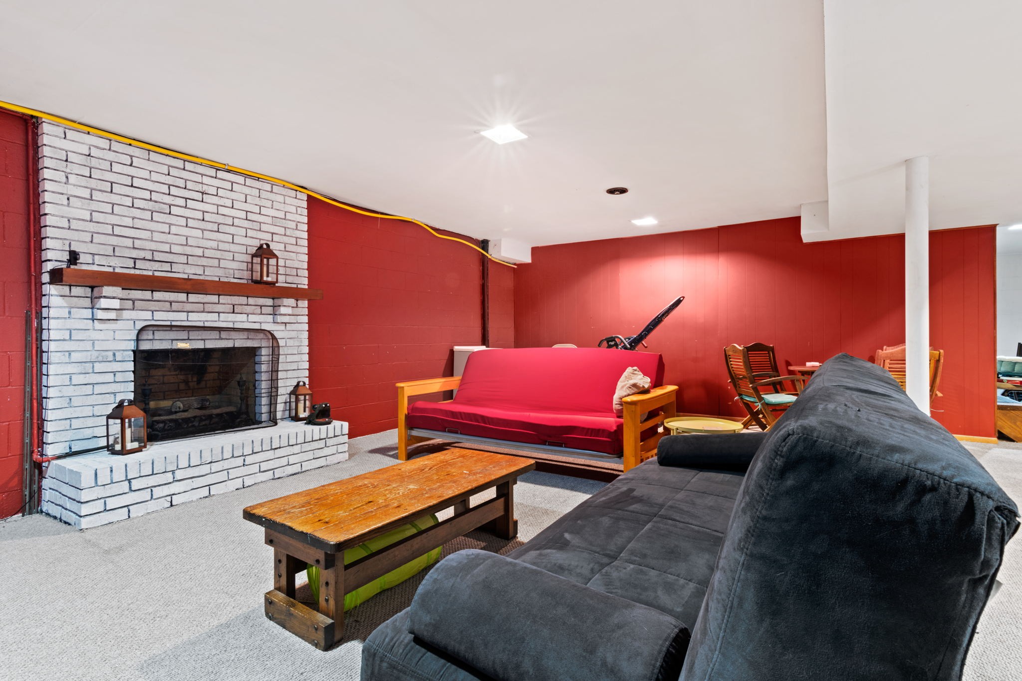 102 3rd Avenue East Springfield, TN 37172 - Photo 49 of 65 a bedroom with furniture and a fireplace