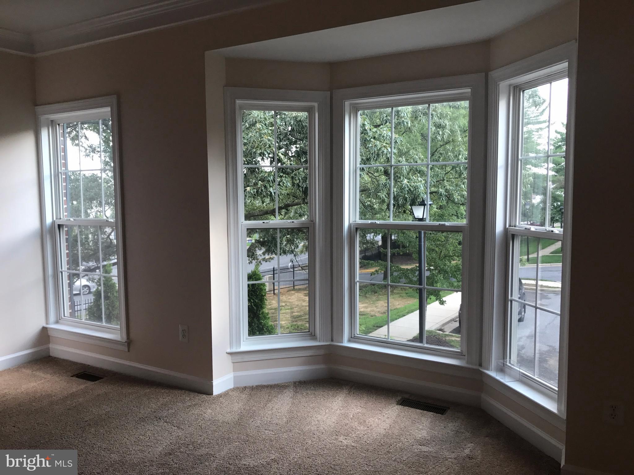 3350 Castle Ridge Circle, Unit 1 Silver Spring, MD 20904 - Photo 29 of 43 Family Room has big BAY WINDOW