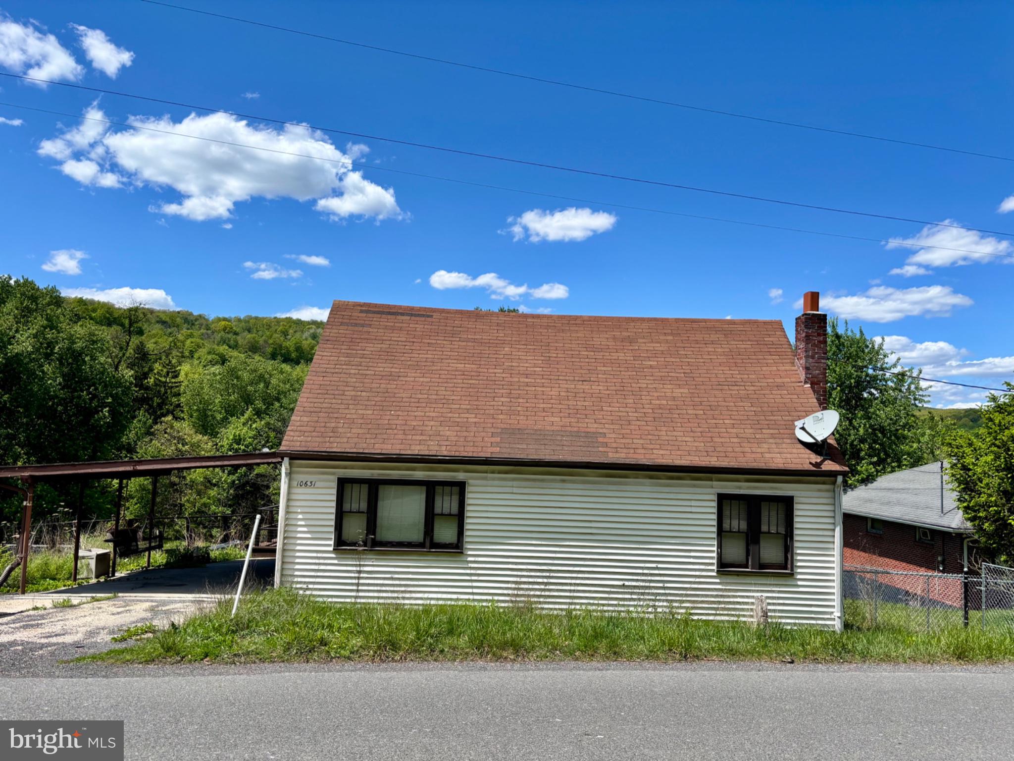 10631 New Hope Road Northwest Frostburg, MD 21532 - Photo 3 of 20 Charming home with scenic backdrop.
