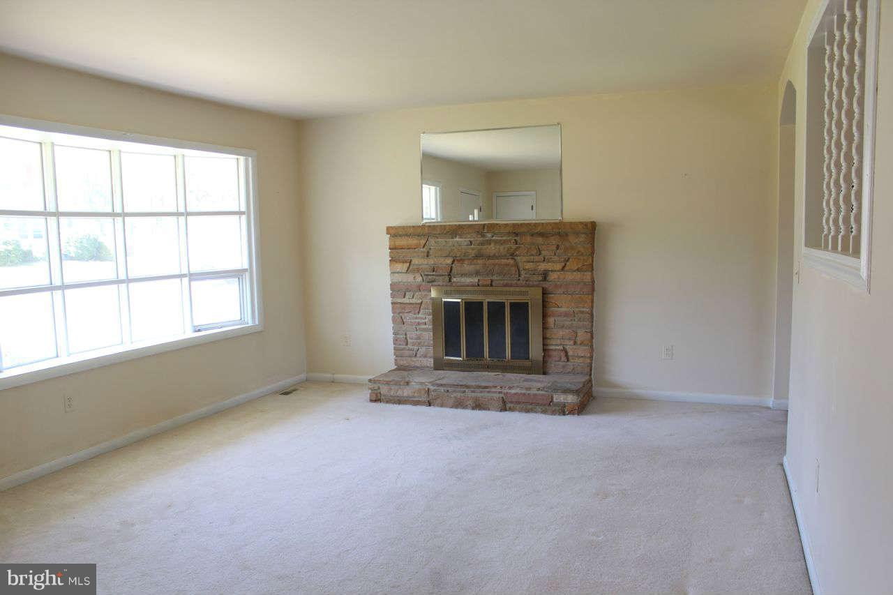 3055 Riverview Drive Riva, MD 21140 - Photo 13 of 30 an empty room with a fireplace