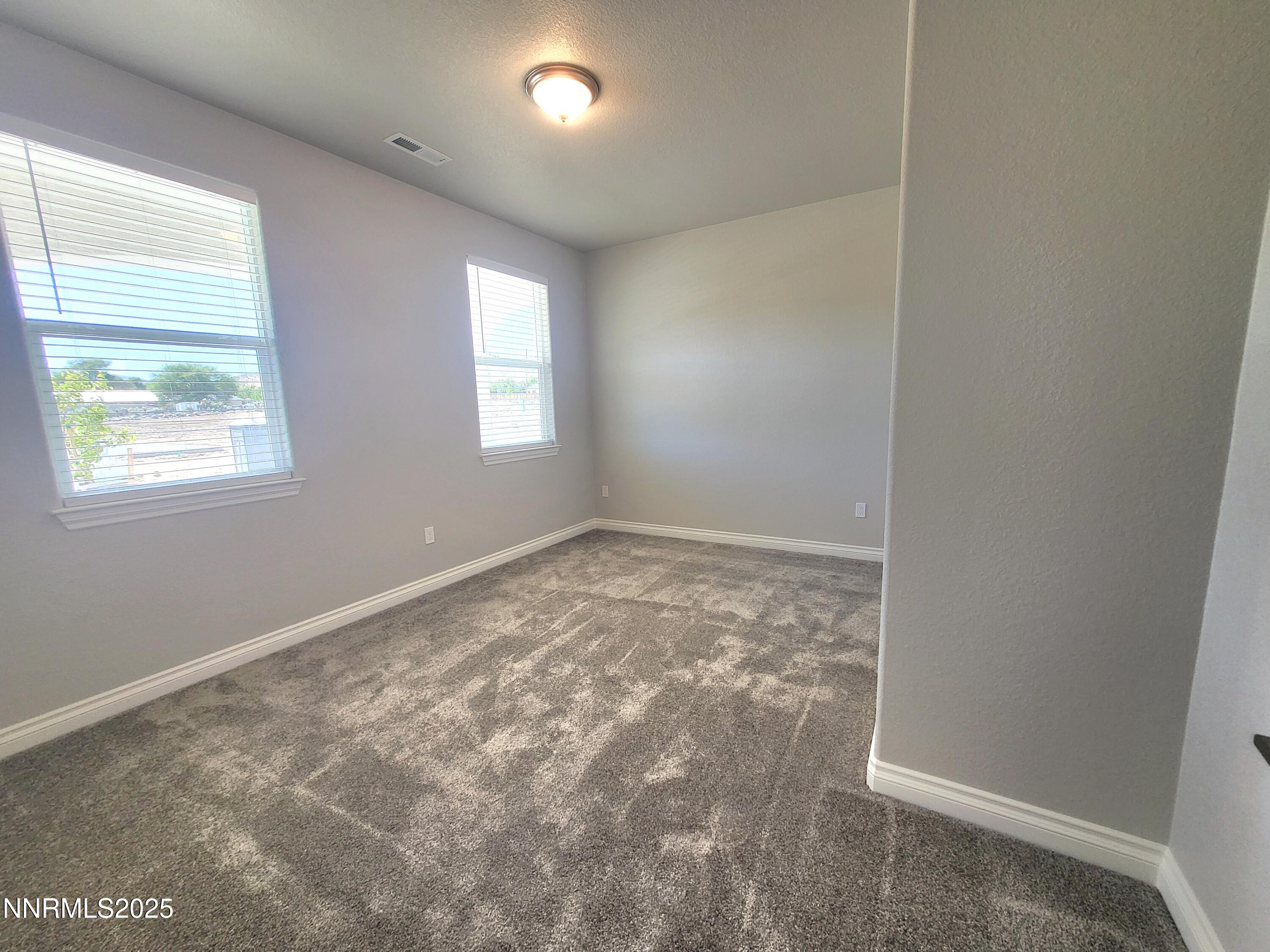 4048 Cold Springs Reno, NV 89508 - Photo 6 of 8 an empty room with windows