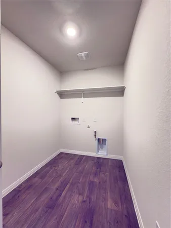 a bathroom with a double vanity sink toilet mirror and bathtub