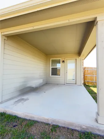 a view of a double vanity sink and a mirror in a room