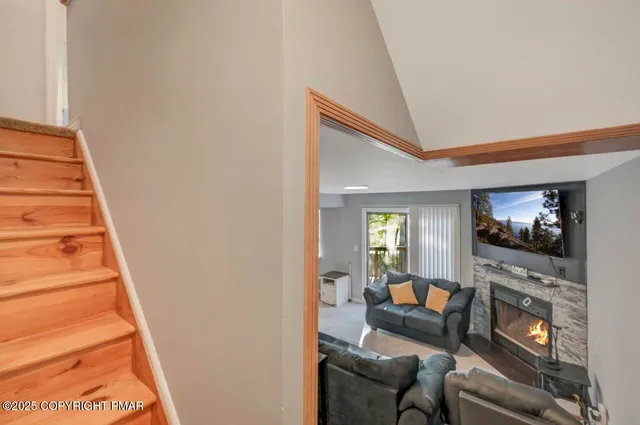 a view of a bedroom from a hallway