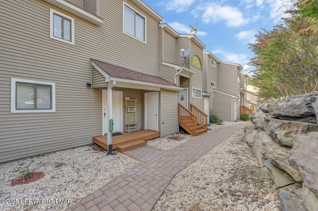 3305 Windemere Drive Bushkill, PA 18324 - Photo 3 of 56 a backyard of a house with barbeque oven