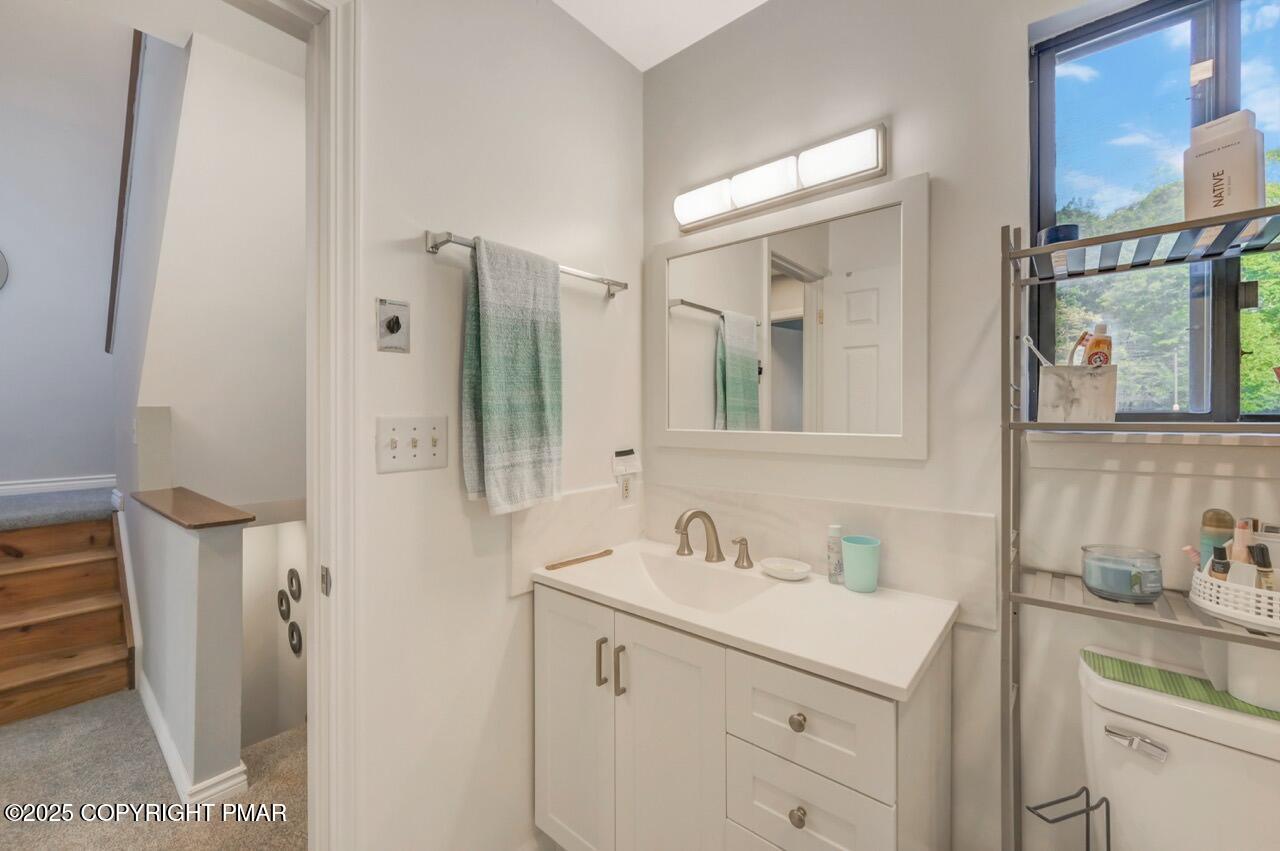 3305 Windemere Drive Bushkill, PA 18324 - Photo 34 of 56 a bathroom with a sink vanity and mirror