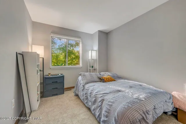 a view of a hallway with windows