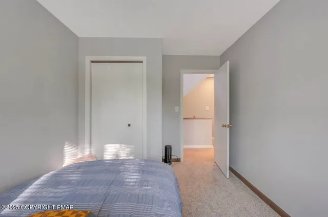 a view of a room with rack and wooden floor