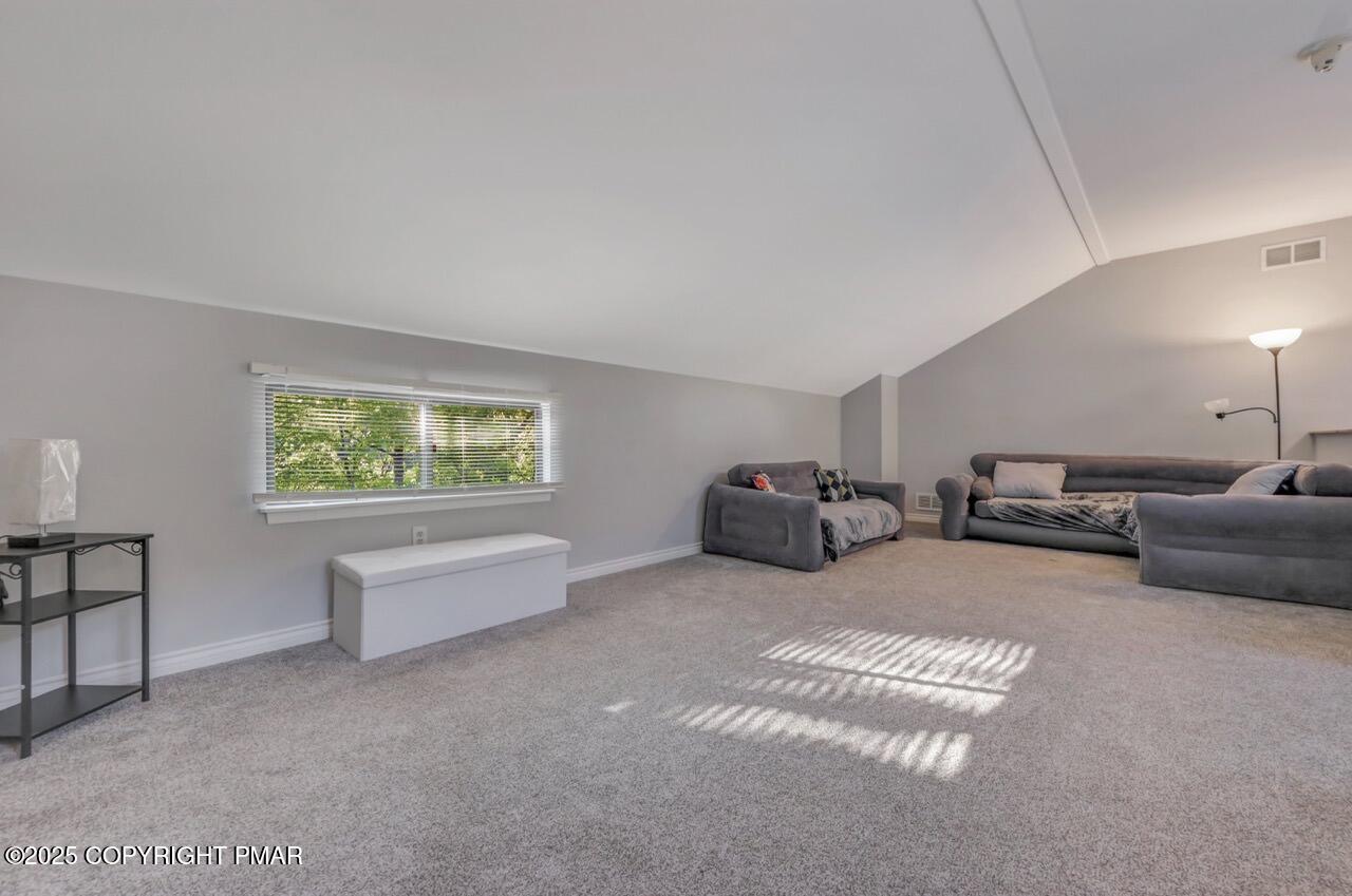 3305 Windemere Drive Bushkill, PA 18324 - Photo 42 of 56 a living room with furniture and a window