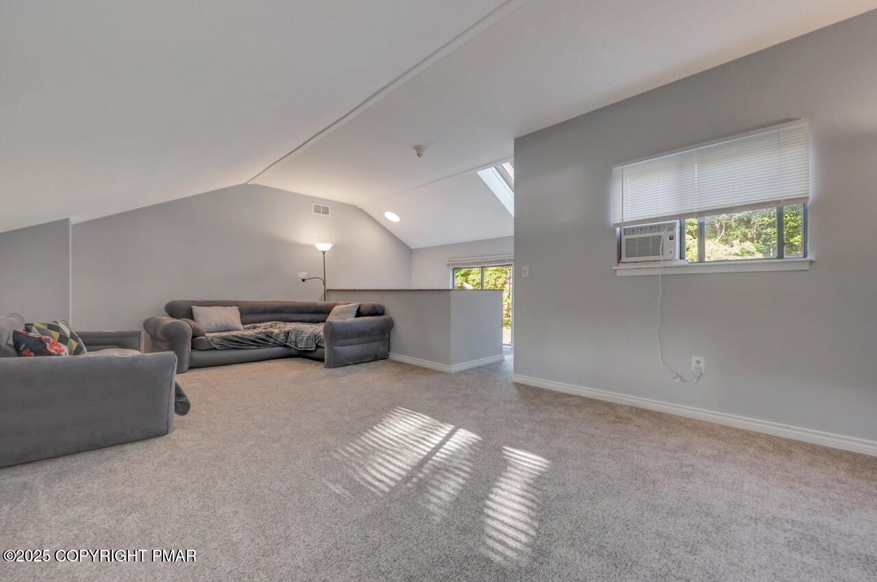 3305 Windemere Drive Bushkill, PA 18324 - Photo 44 of 56 a living room with furniture and a couch