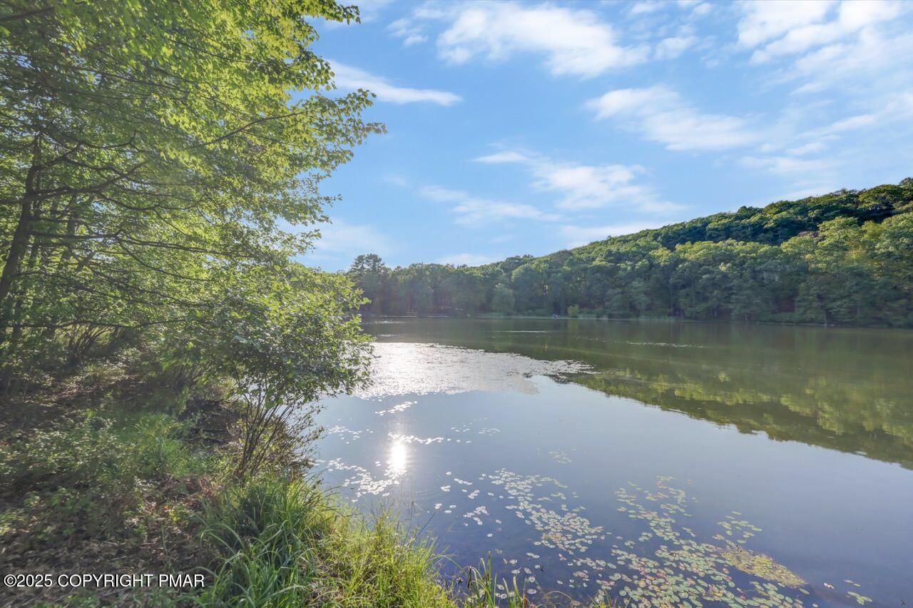 3305 Windemere Drive Bushkill, PA 18324 - Photo 52 of 56 a view of a lake with a city